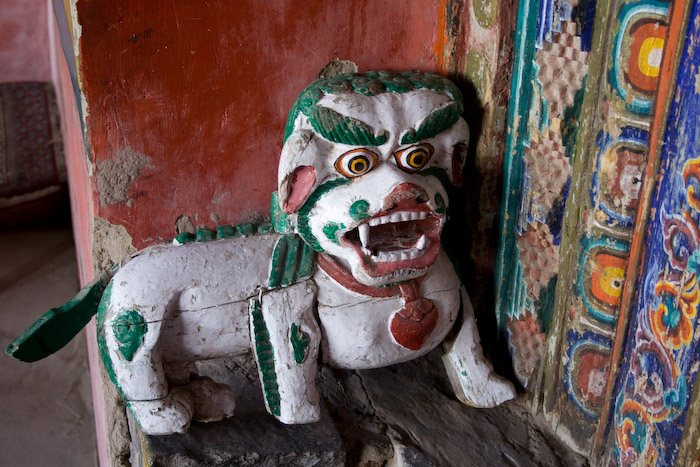 Carving at base of entrance to sanctuary