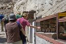 Prayer wheels line the path up to the gompa