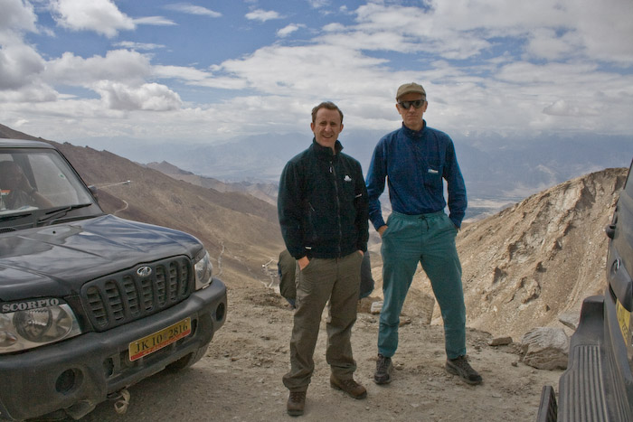 Mark and Alex on the road - we had to stop while the army cleared a small rock slide further up - you can see the road snaking behind them