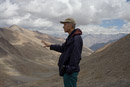 Mark expounds on something, with the Karakoram behind him