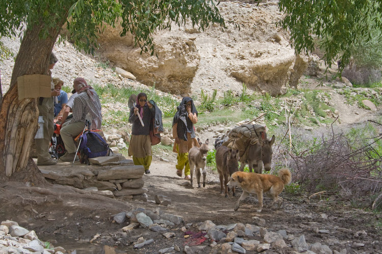 Locals passing by.